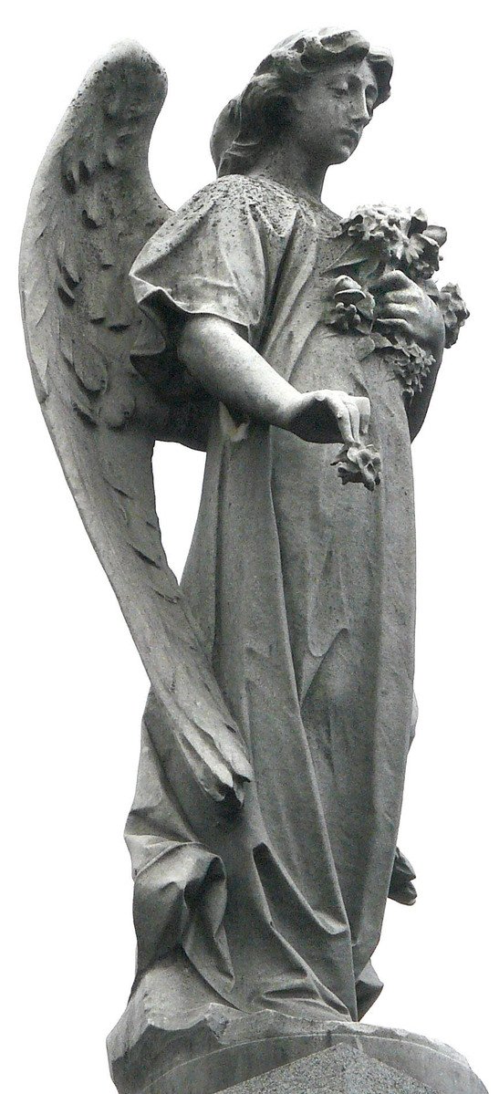 an angel statue holding a bouquet of flowers