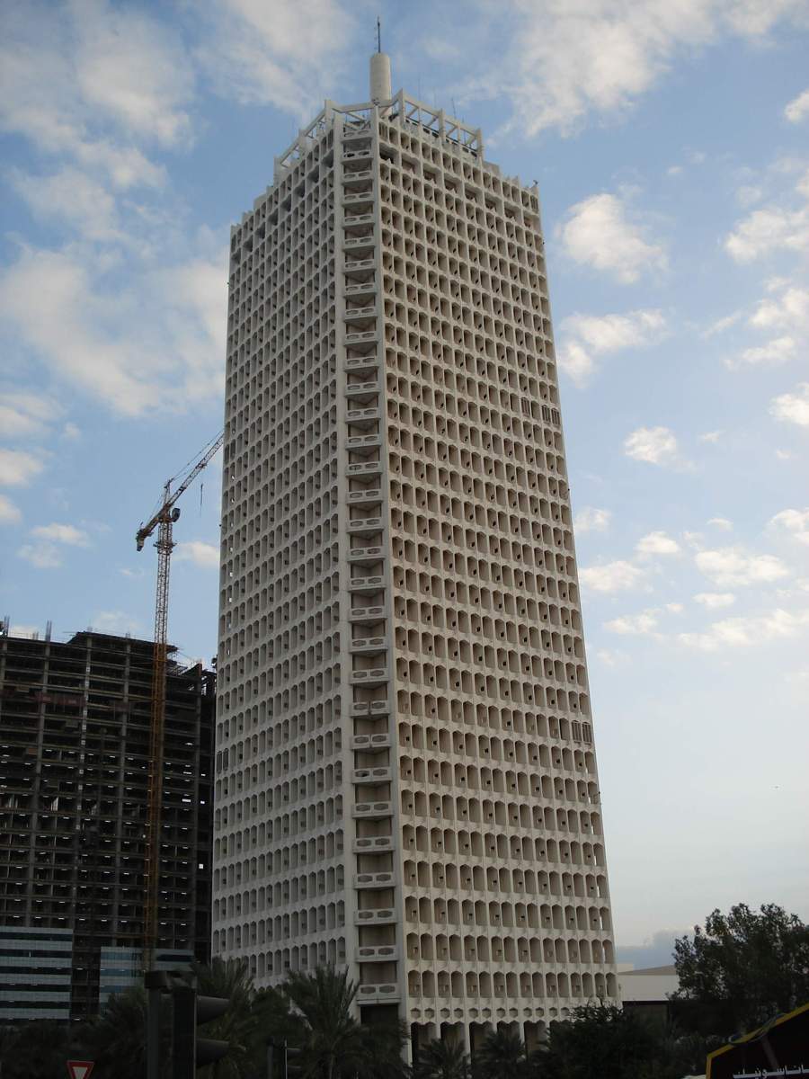the tall building has balconies on each floor
