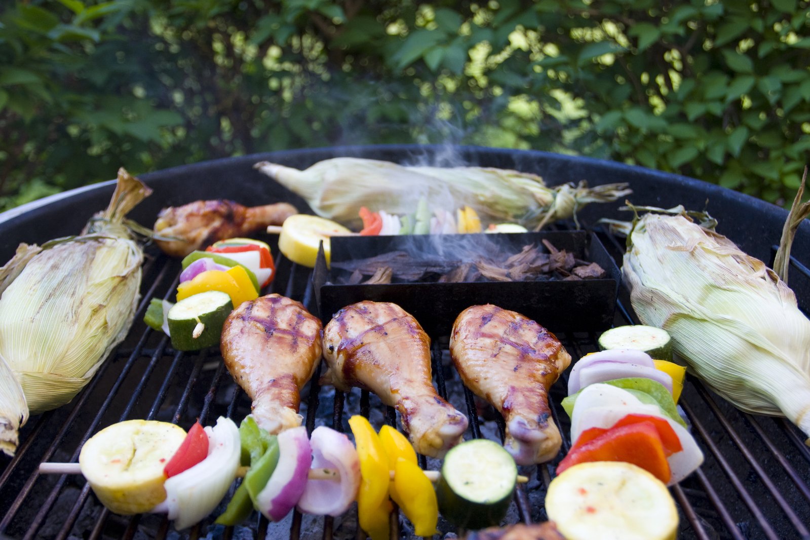 a grill with several different food items on it