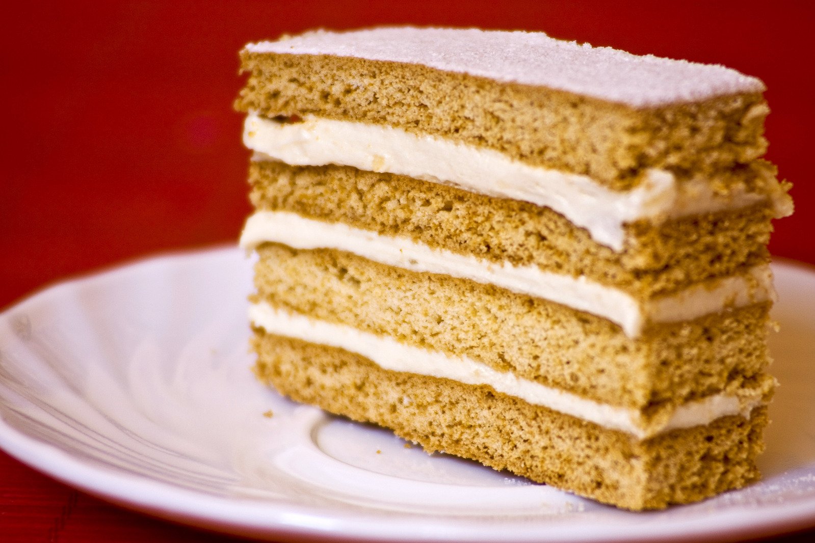 a slice of cake is sitting on a plate