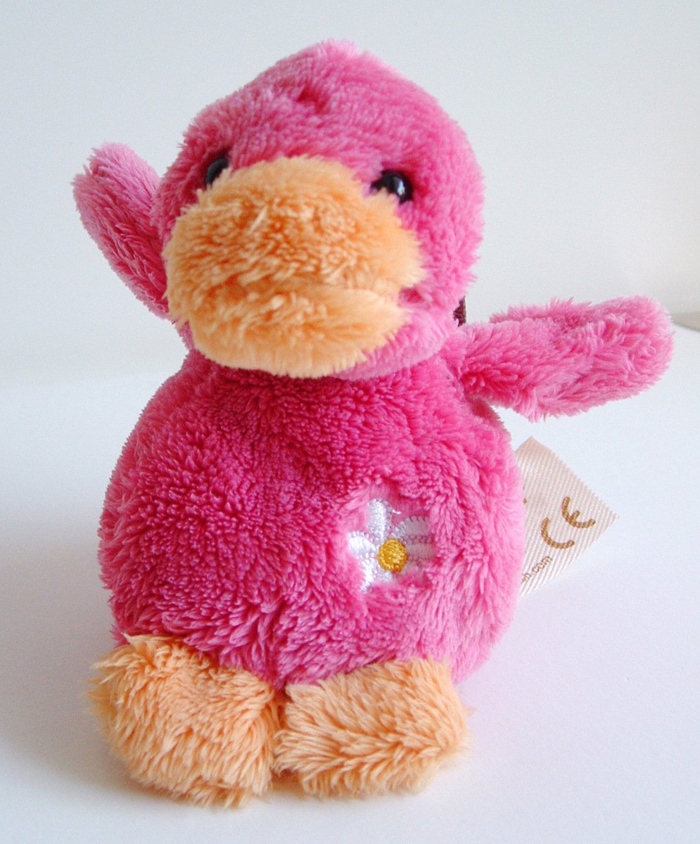 a bright pink stuffed duck with a tag sitting next to the white background