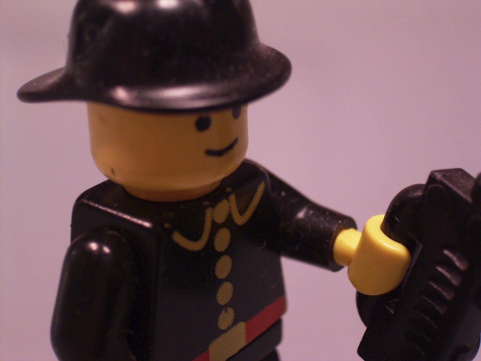 there is a lego person wearing an officer outfit