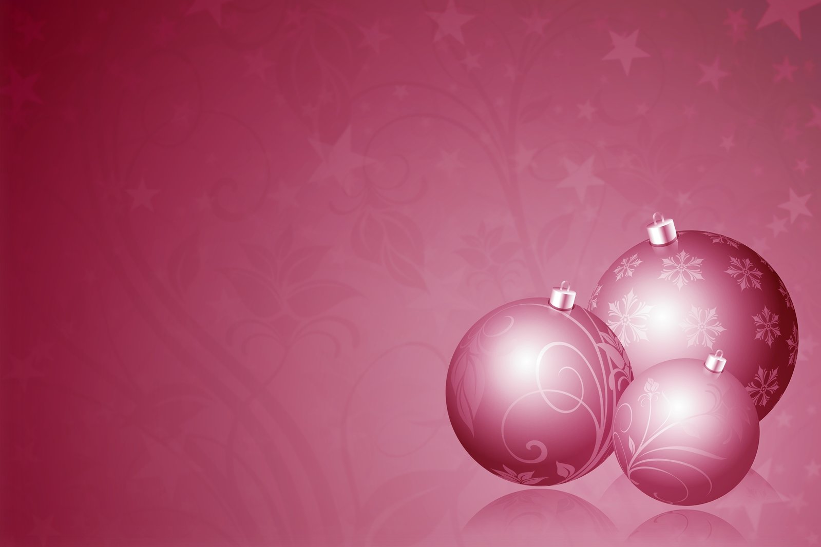 two christmas balls in pink on the red background