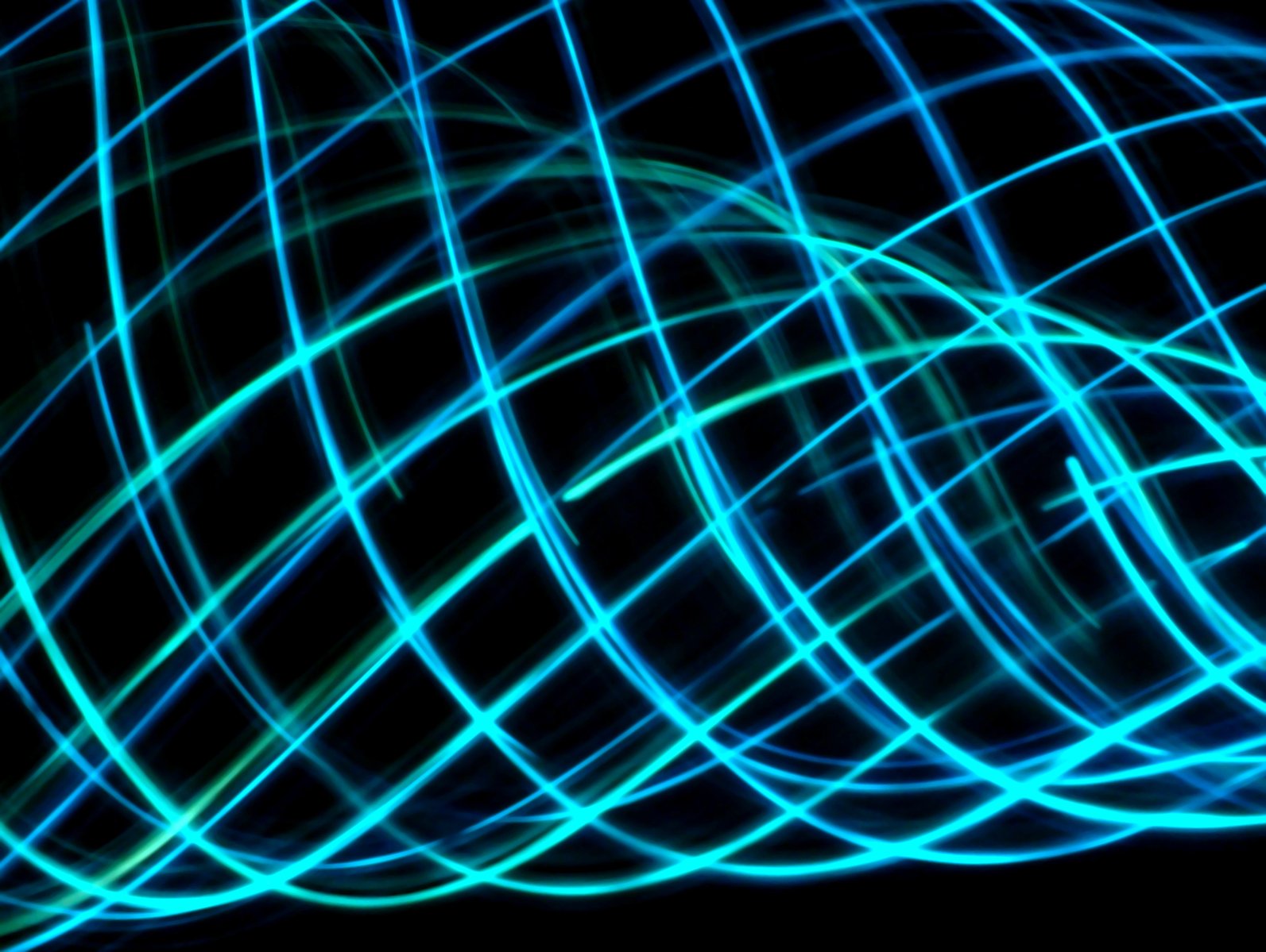 many blue lines are being illuminated on a black background