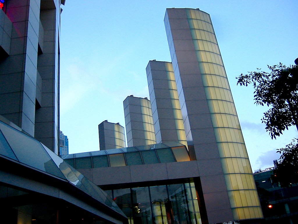 modern buildings stand against the blue sky