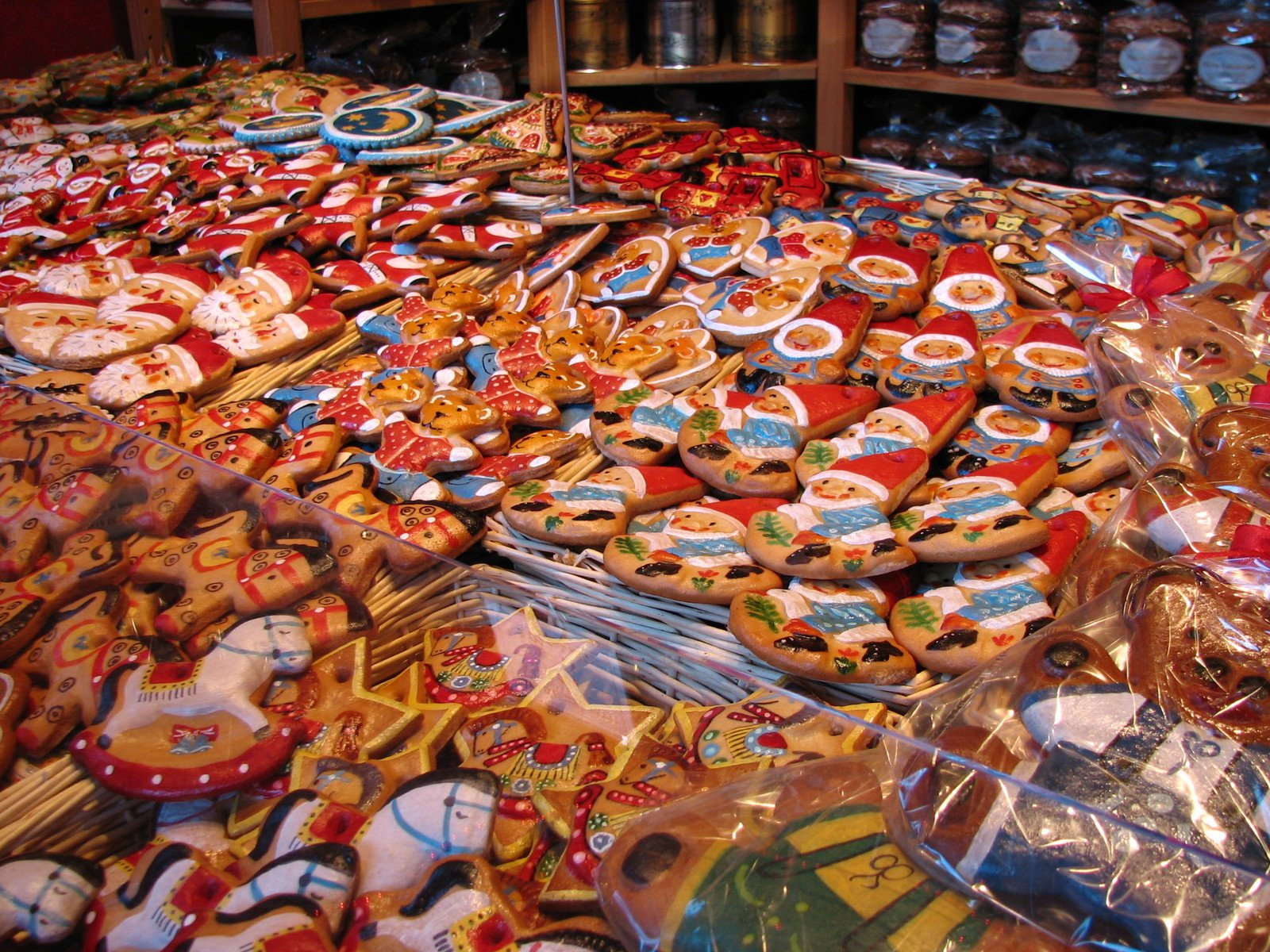 a display case filled with lots of cookie covered cookies