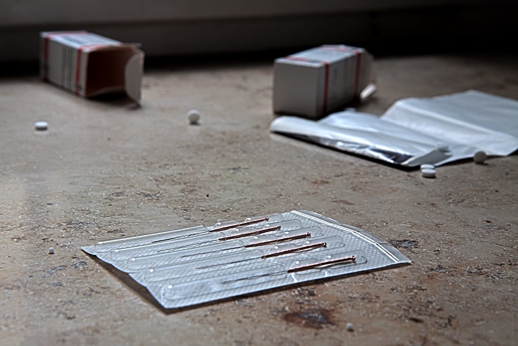 an image of the inside of a room that is littered with metal