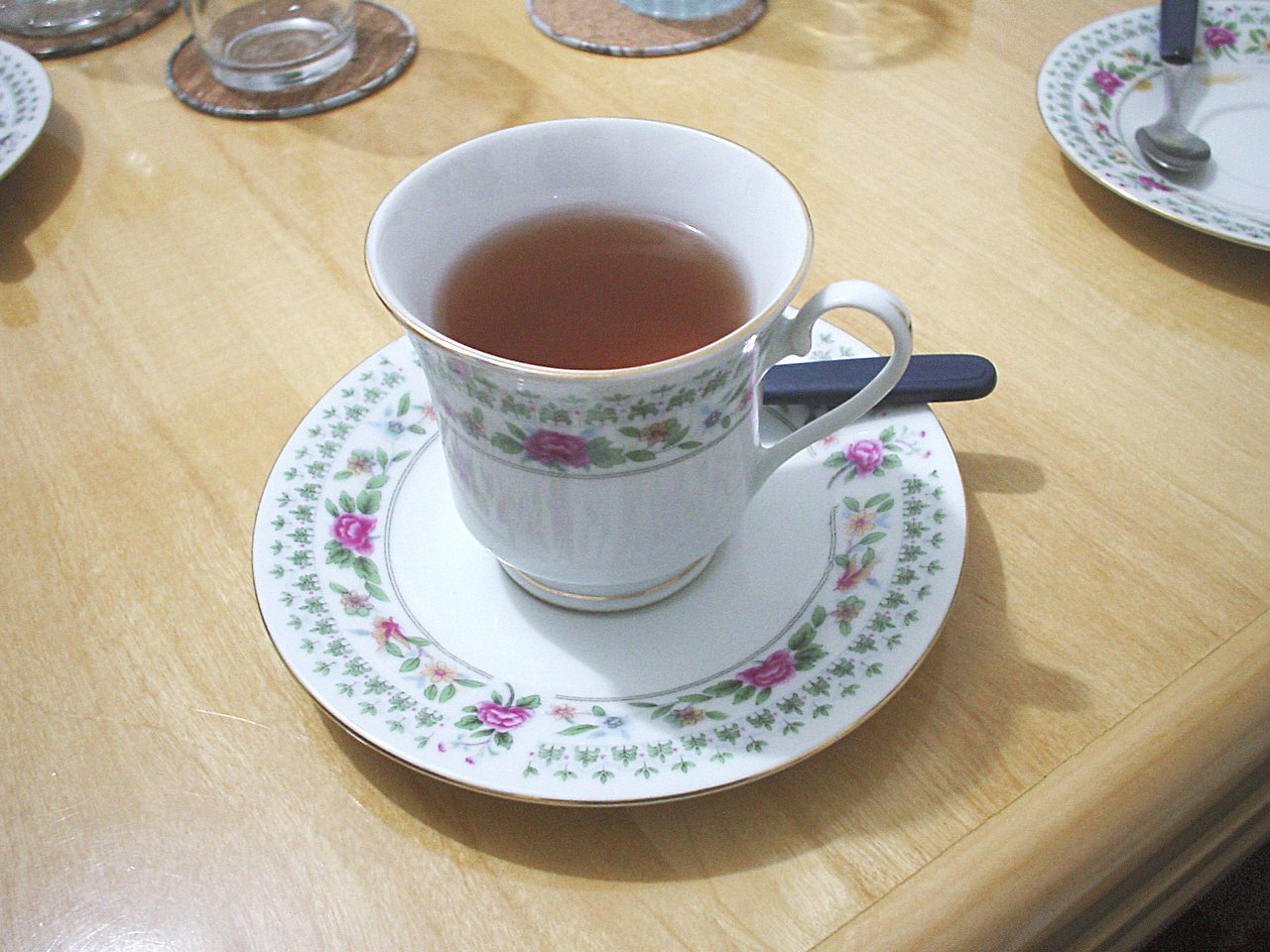 there is a cup of tea on the table