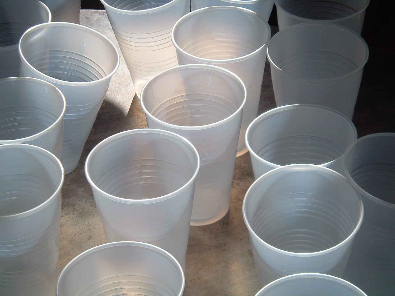 a bunch of cups that are sitting on a table