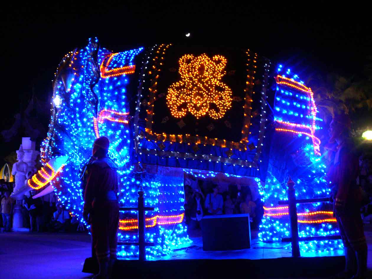 a bright blue display with lights of elephants