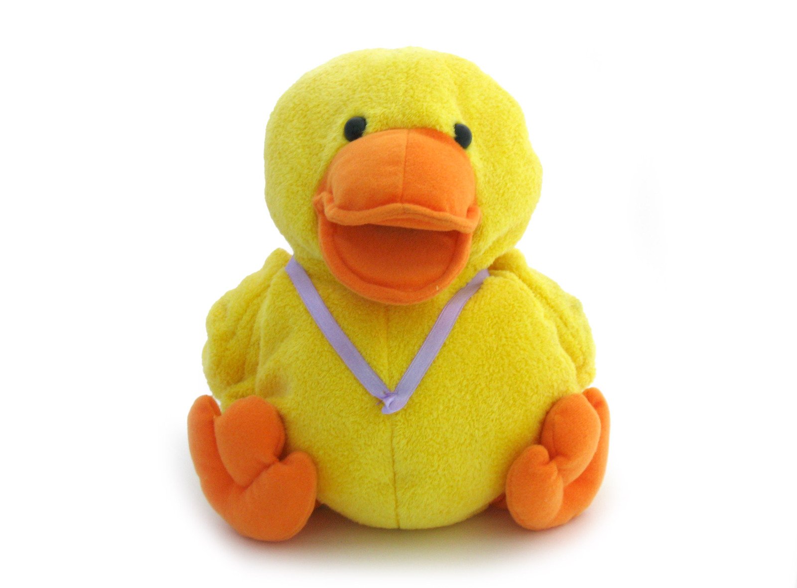 a stuffed toy duck sitting down