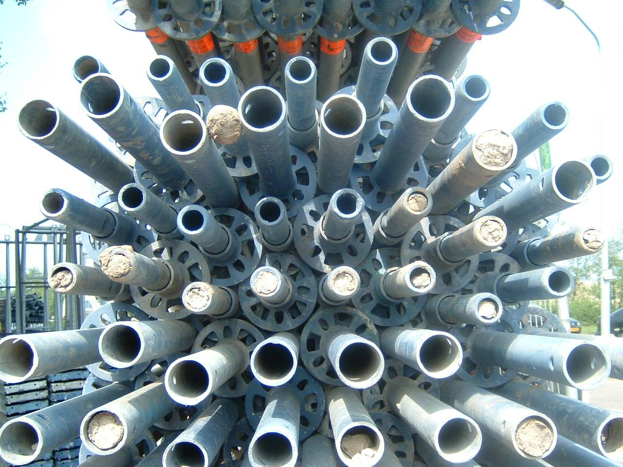 many large pipes and valves in the center of a circle