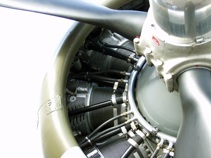 a propeller sits open and has various cables