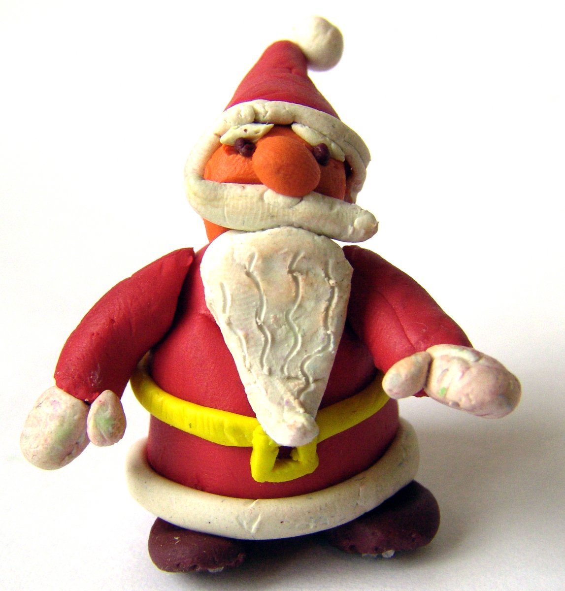 a small red and white plastic santa clause