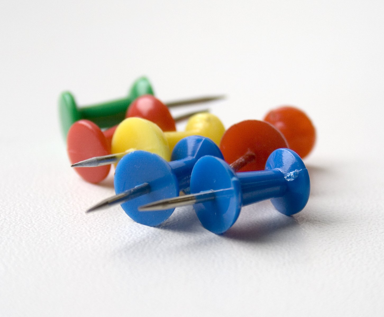 a group of small plastic hers on top of white table