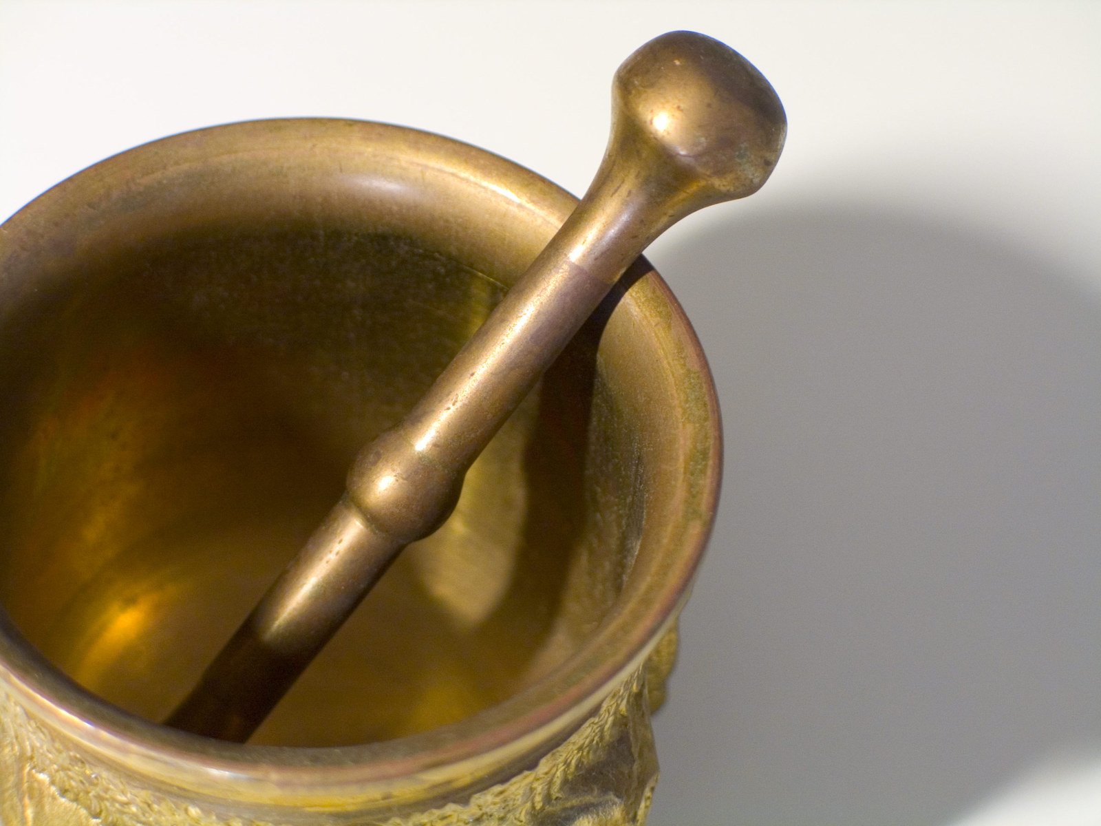 a close up of a spoon in a cup