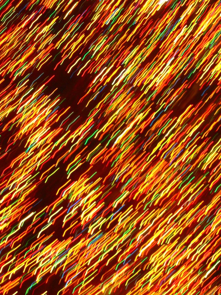abstract streaks of light in red and yellow