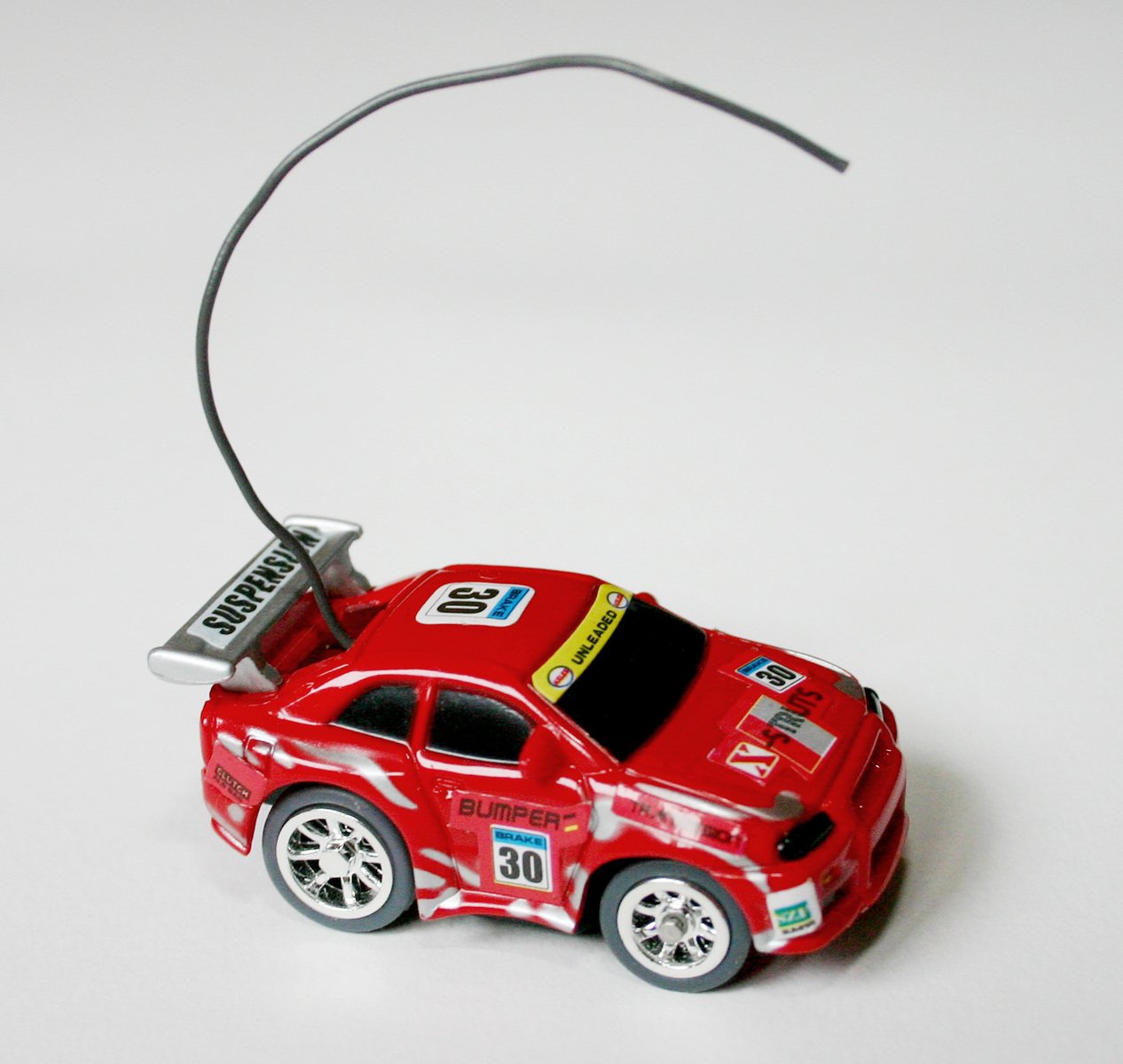 a red toy car with a microphone attached to it