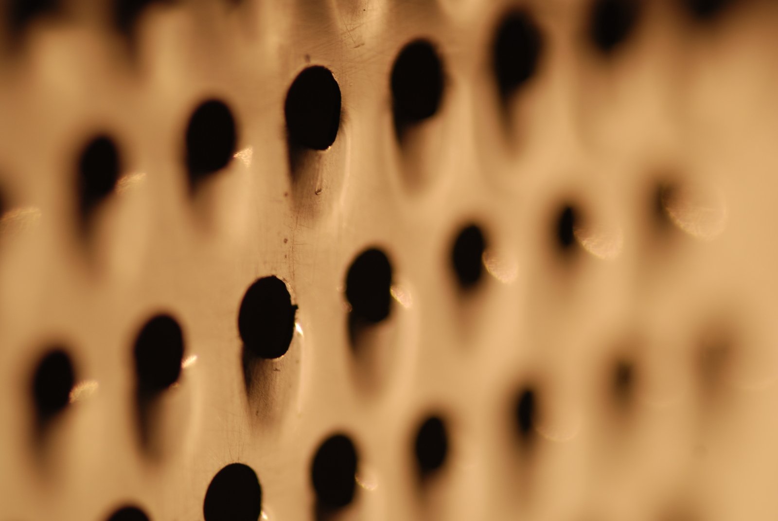 the holes in this decorative wall are black