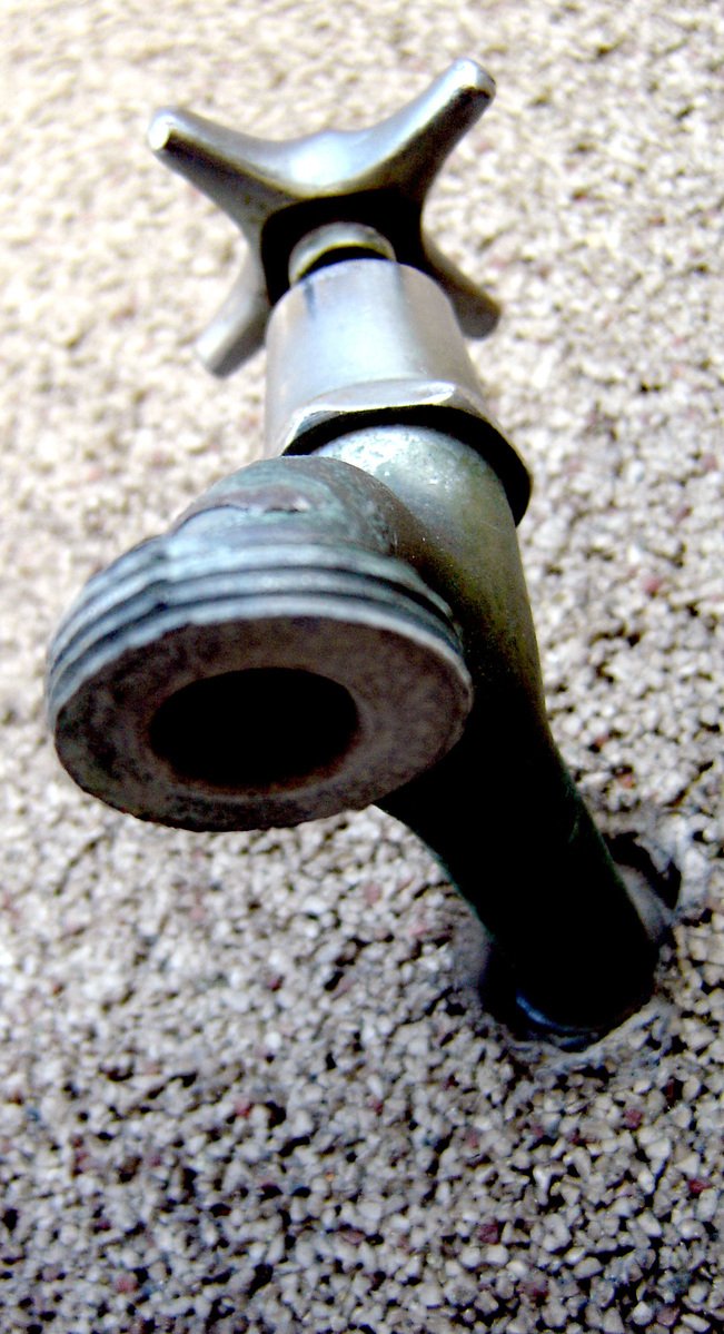 closeup of the back end of a bike with rust