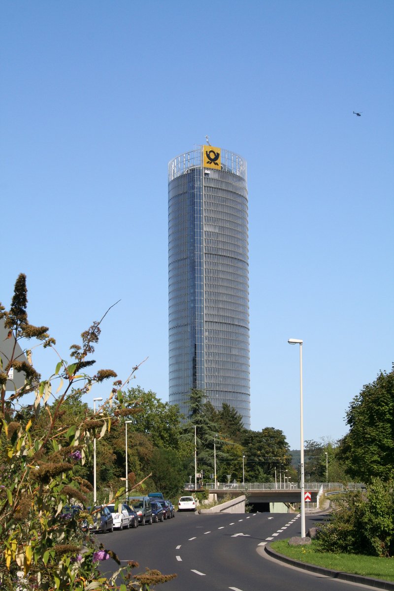 a tall building with an eagle sitting on the top