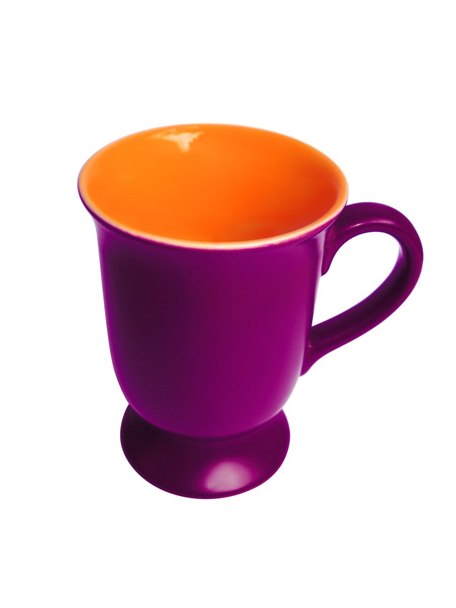 a purple and orange cup sitting on a white surface