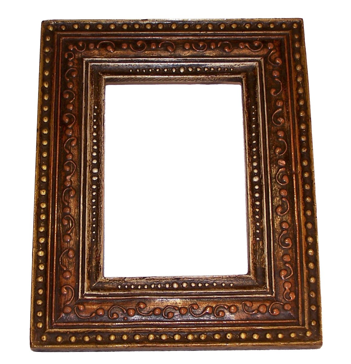 an antique metal frame on a white background