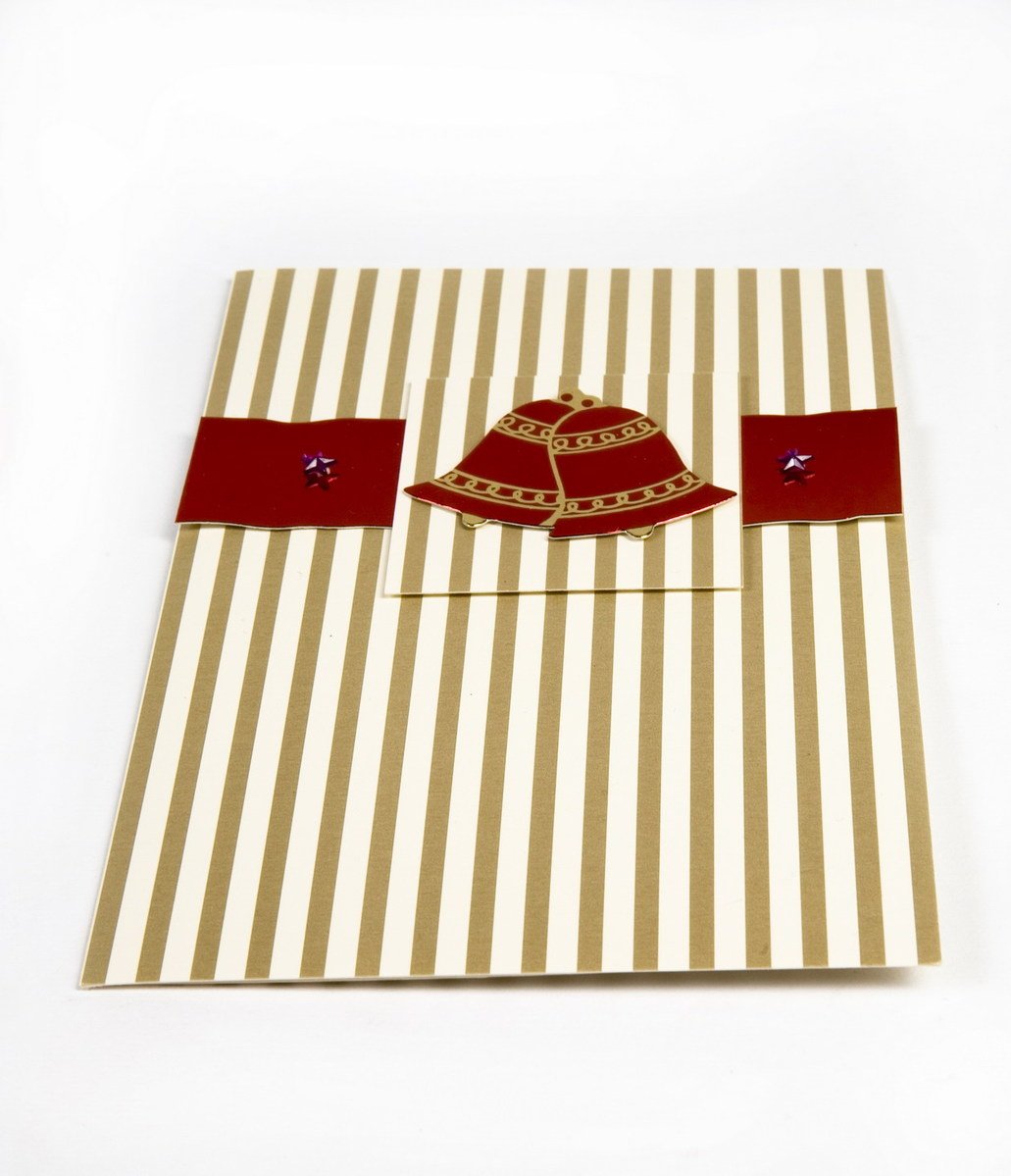 a striped envelope with a red and white pinwheel