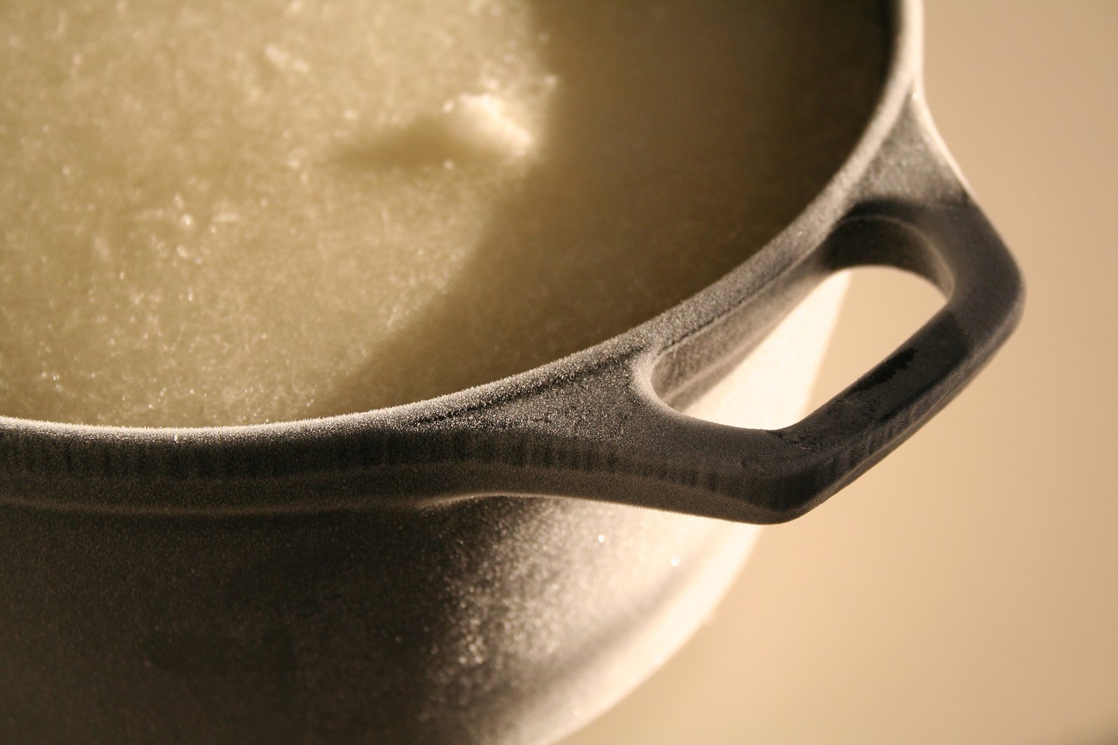 a pan with soing inside of it that looks like a fork