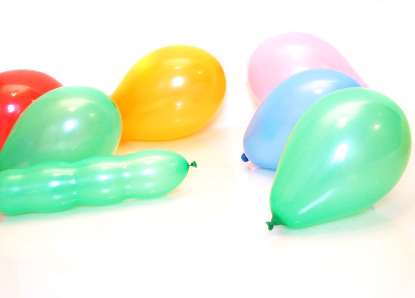 colorful balloons sitting on top of each other