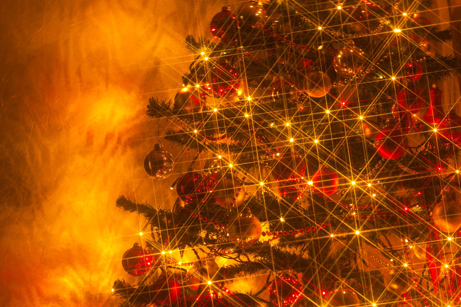 a big colorful christmas tree covered in lights