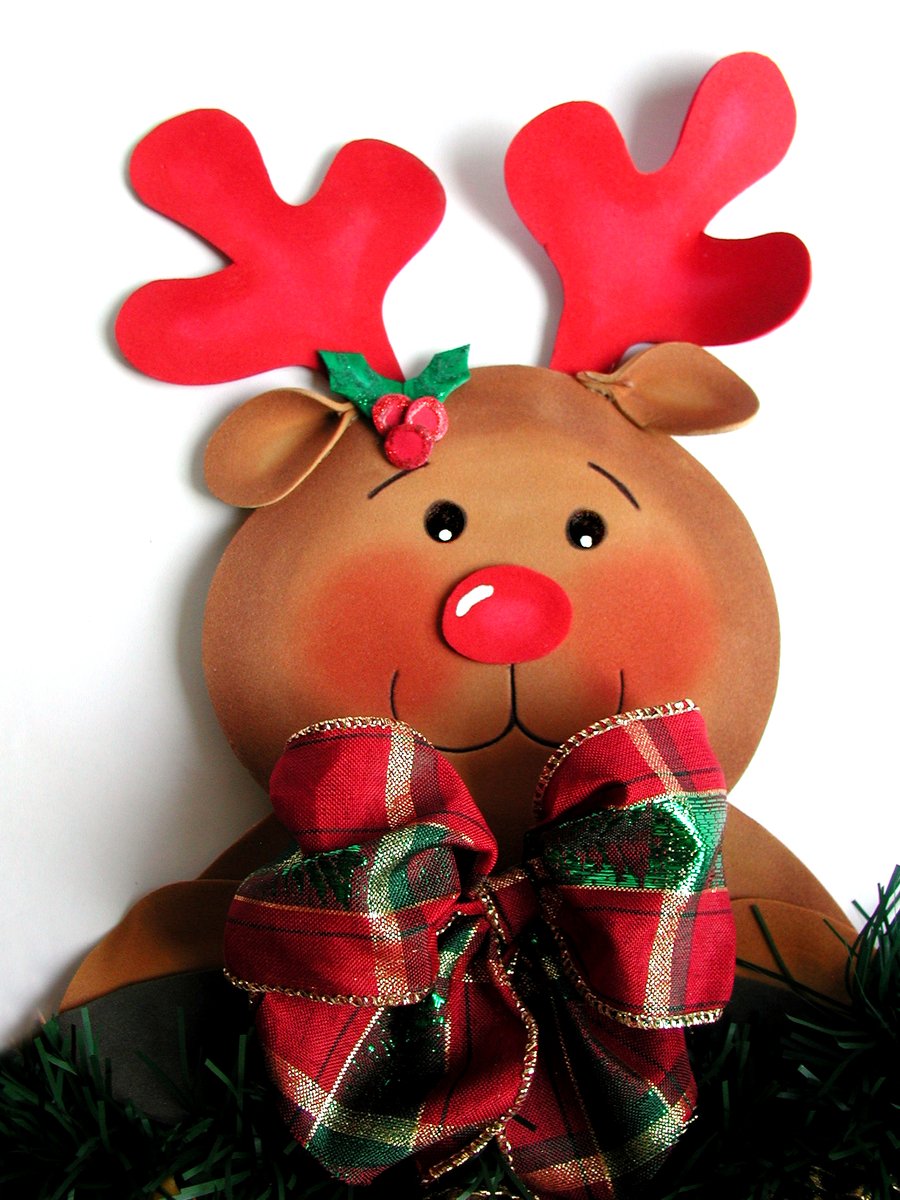 stuffed reindeer decoration made with fabric bows