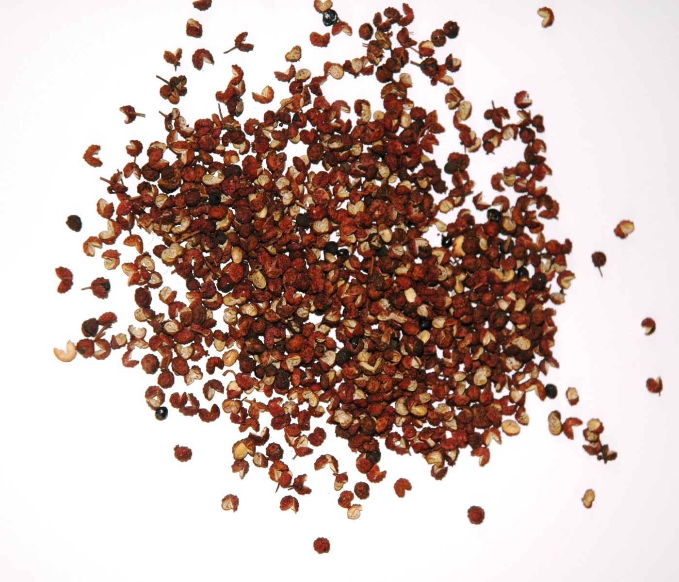 small amount of chopped red and yellow seeds