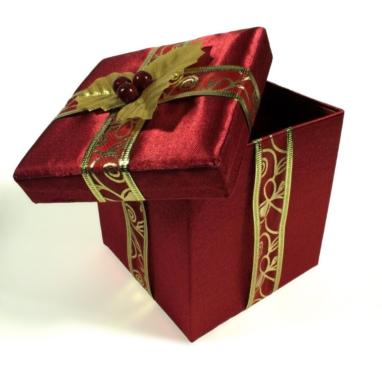 an elegant red box wrapped in gold with a ribbon and on