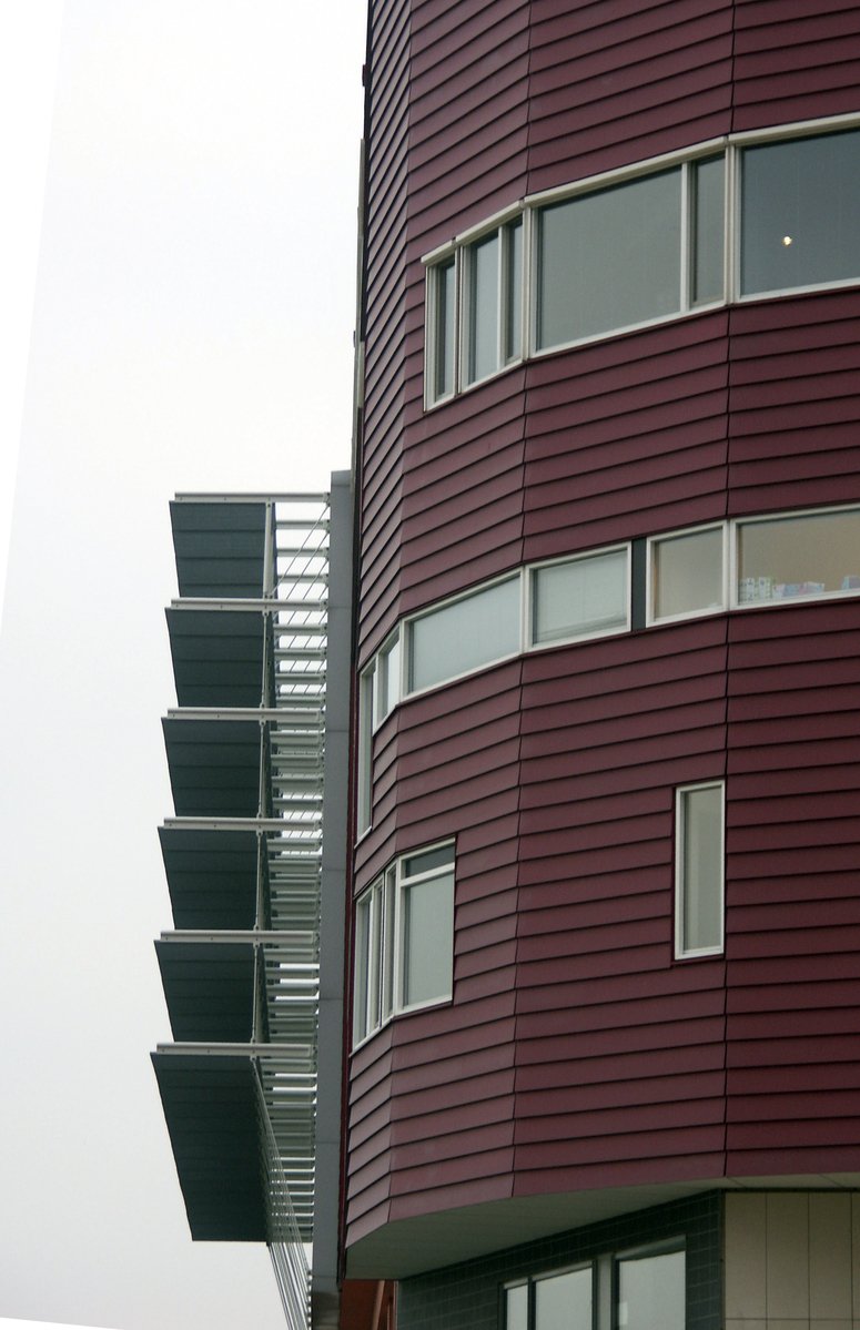 an image of a building with balconies on it