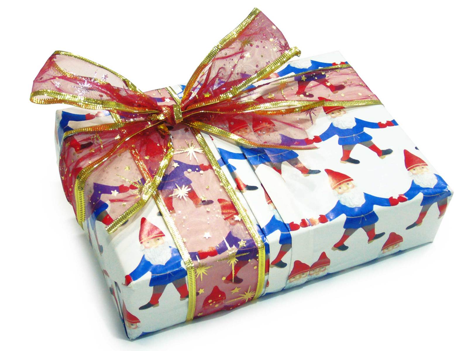 a close up of a wrapped gift on a white surface