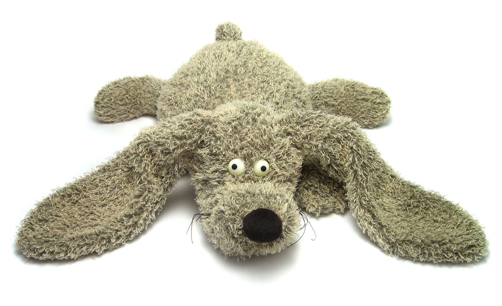 this is a stuffed animal dog that looks like it has no nose and nose