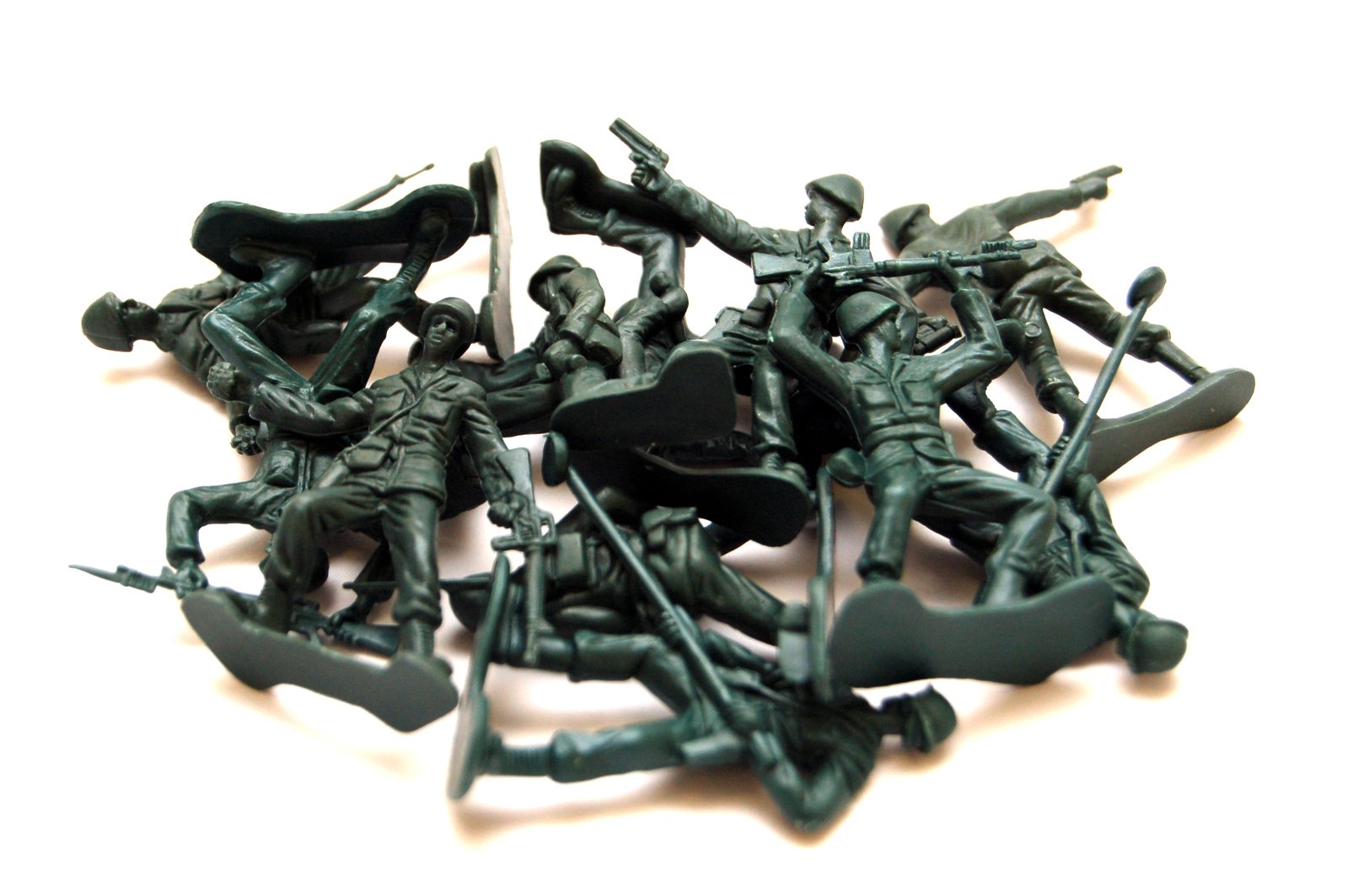small toy soldiers are shown on the table