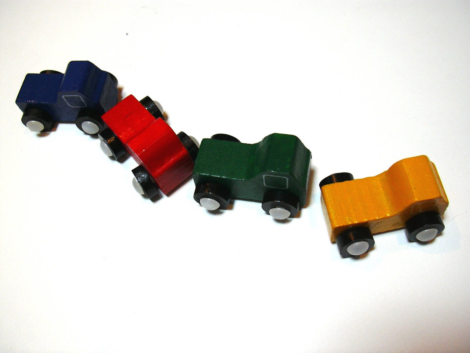 wooden toy vehicles are in the form of a car