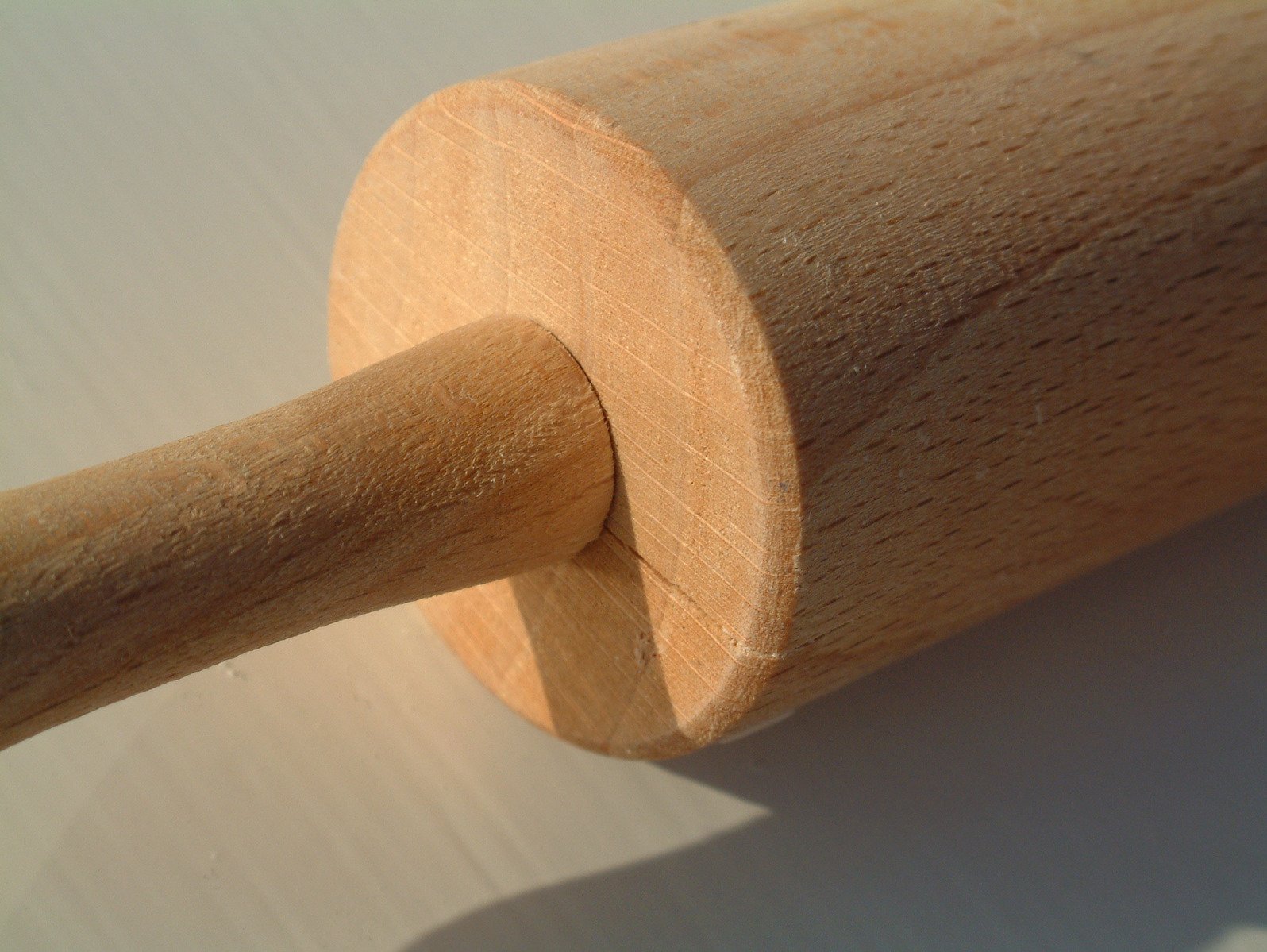close up image of wooden object with a ring on it