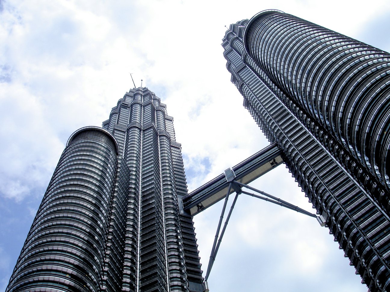 view up at tall structures with blue sky in the background