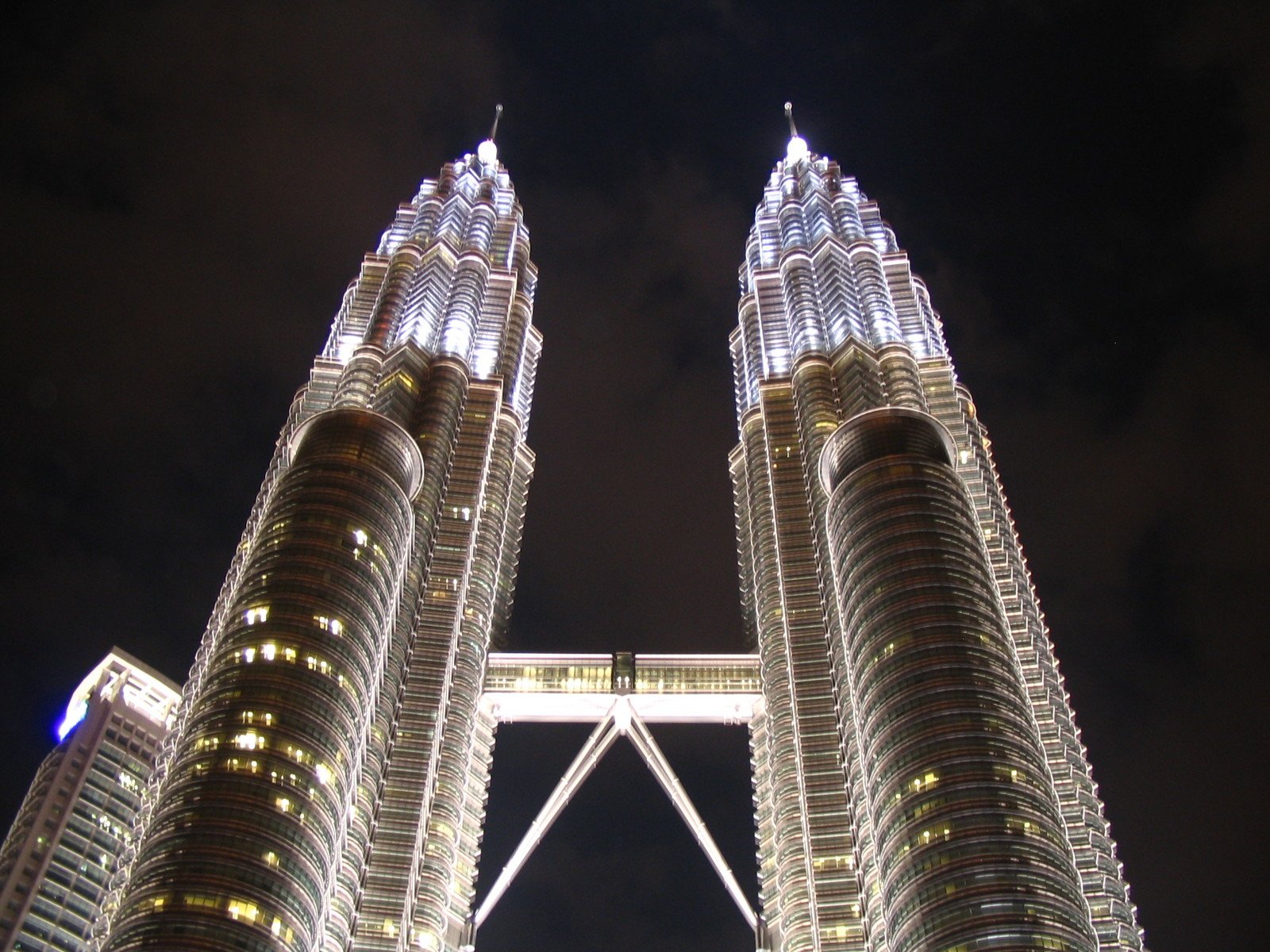 the top view of two towers in the night time