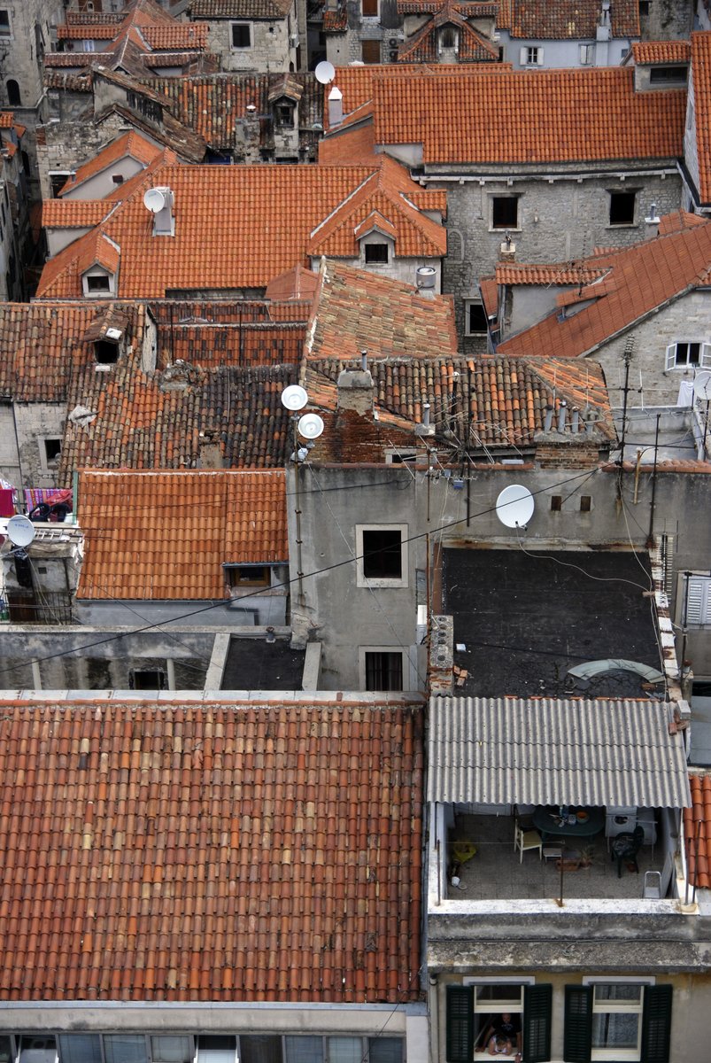 many orange tiled rooftops and old buildings