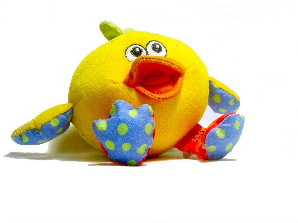 a stuffed toy that has a mouth