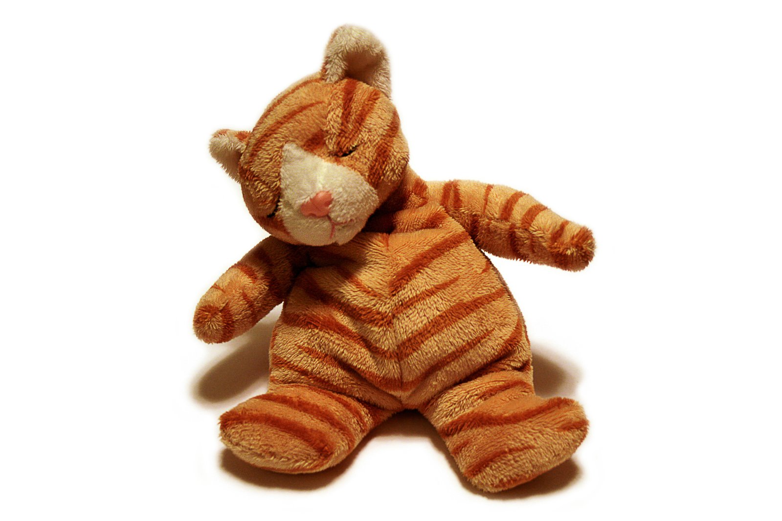 the teddy bear is very cute with a striped pattern