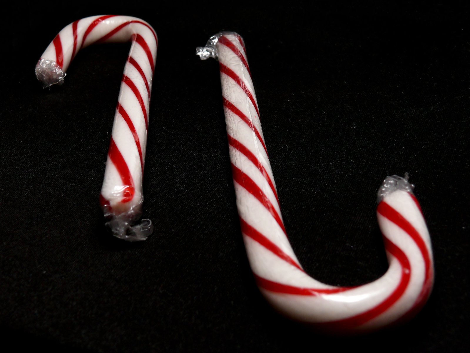 candy canes lying on top of a table