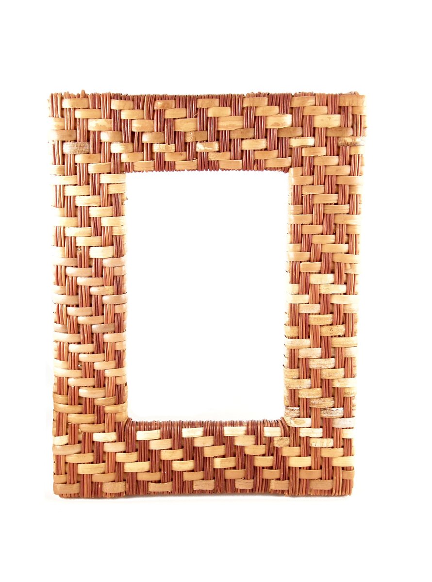 an empty square shaped frame made out of woven items