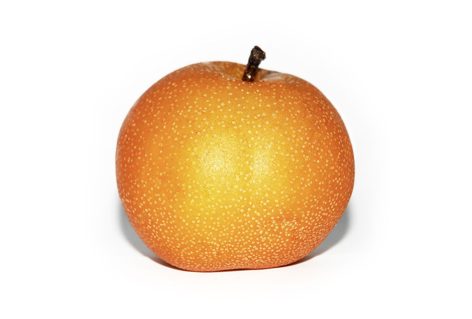an orange that is oranged on a white background