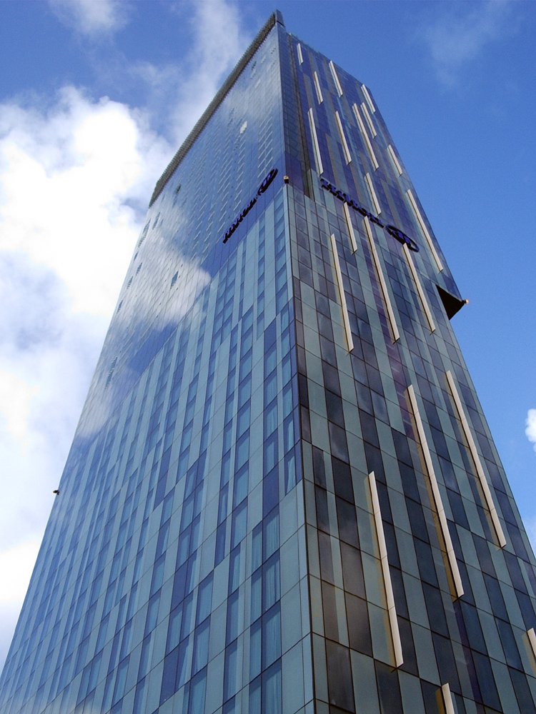 this is the side of an office building against the sky