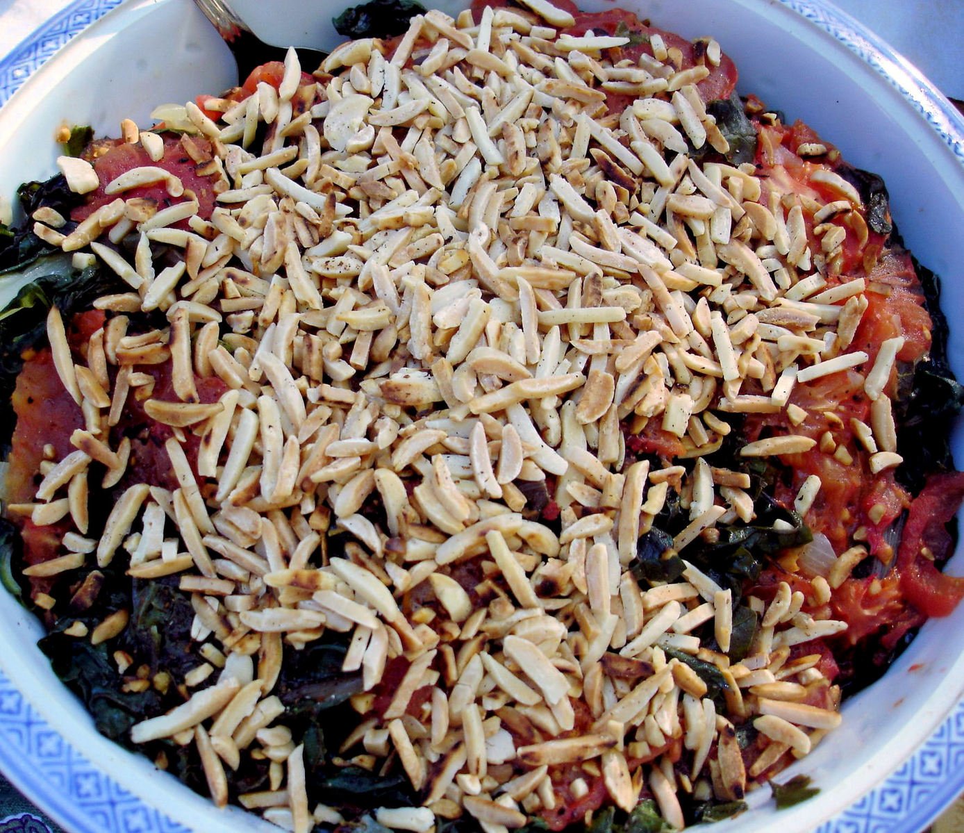 close up of an asian dish in blue and white bowl